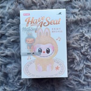 The Monsters Have a Seat Collectible Labubu Figure -Hehe